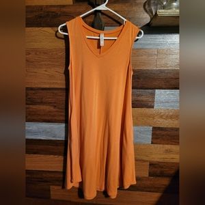 One short sleeve, Two long sleeve pocket dresses, All fit size Medium